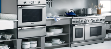 Image showing a resturant kitchen and oven in stainless stell. It is a dual fuel oven range. Appliance Repair OKC Services